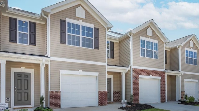 5504 Avery Dr, Trinity, NC 27370 - multi unit property with a garage, brick siding, and driveway