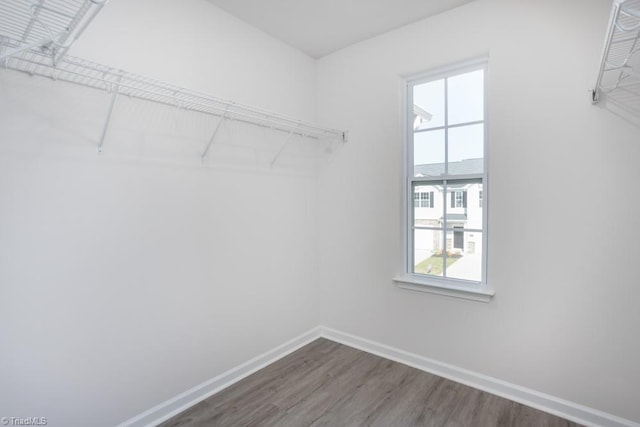 5504 Avery Dr, Trinity, NC 27370 - spacious closet featuring dark wood-style floors