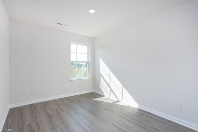 5504 Avery Dr, Trinity, NC 27370 - empty room featuring wood finished floors, baseboards, and recessed lighting