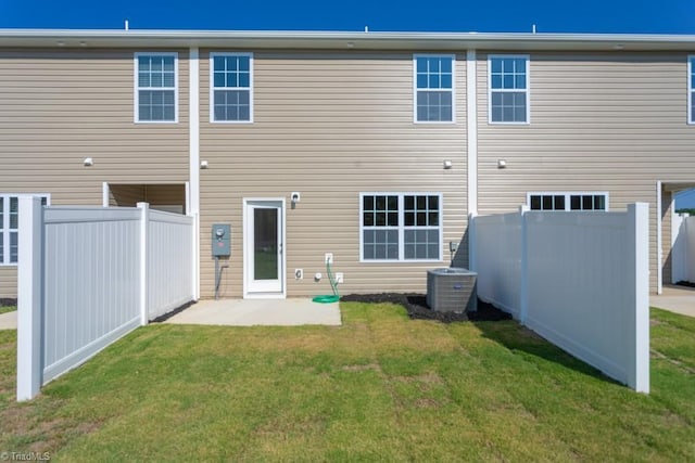 5504 Avery Dr, Trinity, NC 27370 - back of property with central AC unit and a patio