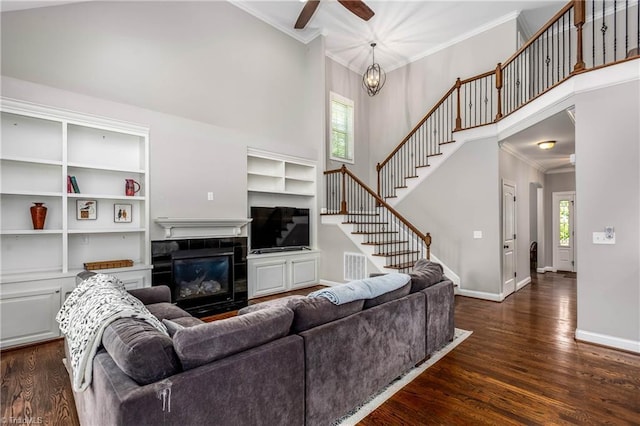 3632 Sally Kirk Rd, Winston-Salem, NC 27106 - living area with crown molding, a ceiling fan, stairs, dark wood-style flooring, and baseboards