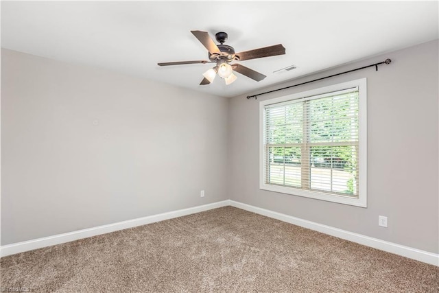 3632 Sally Kirk Rd, Winston-Salem, NC 27106 - carpeted spare room featuring baseboards and a ceiling fan