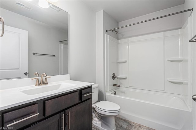 full bathroom featuring shower / bathing tub combination, vanity, and toilet