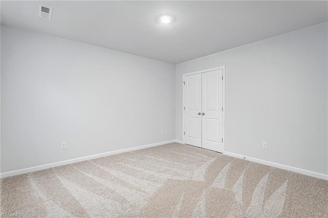 spare room with carpet