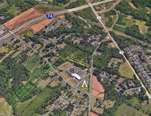 aerial overview of property's location featuring property boundaries highlighted