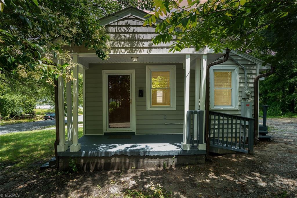 306 Winston St, Greensboro, NC 27401 - property entrance with a porch