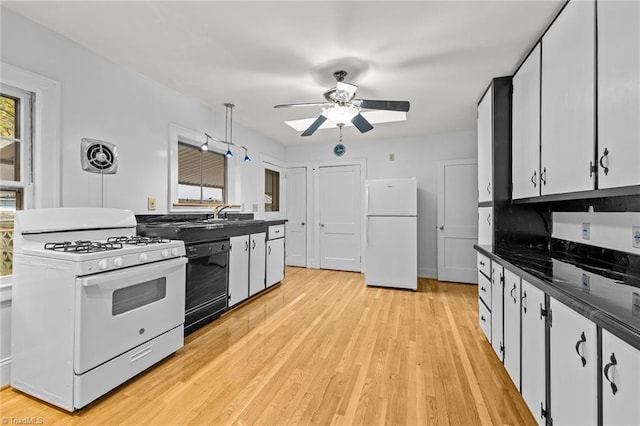 kitchen featuring white cabinetry, sink, ceiling fan, white appliances, and light hardwood / wood-style flooring