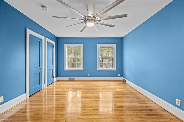 unfurnished bedroom featuring light hardwood / wood-style floors and ceiling fan