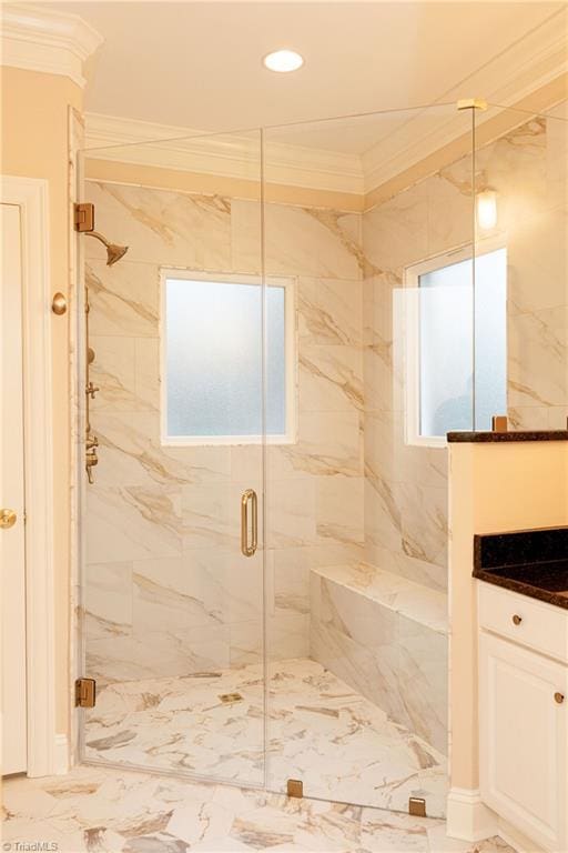 bathroom featuring crown molding and an enclosed shower