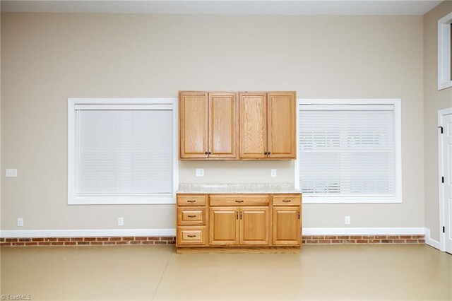 kitchen with light tile patterned flooring