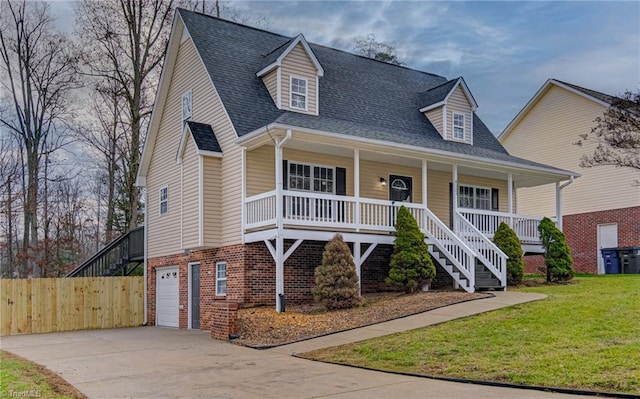 cape cod house with a porch, a garage, and a front yard