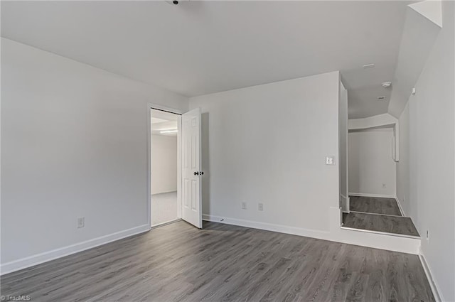 spare room with hardwood / wood-style floors