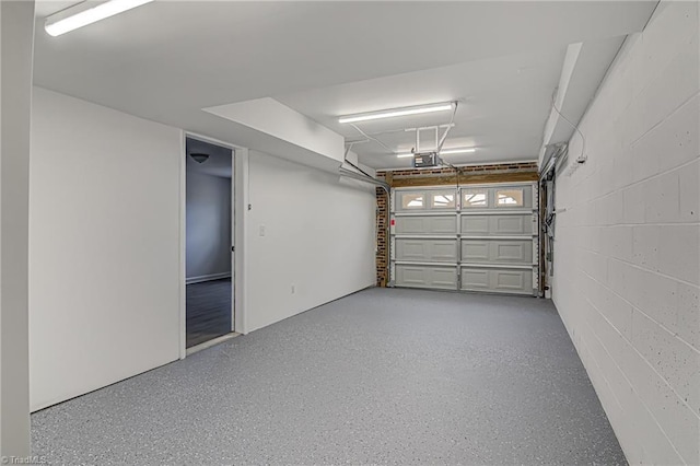 garage featuring a garage door opener