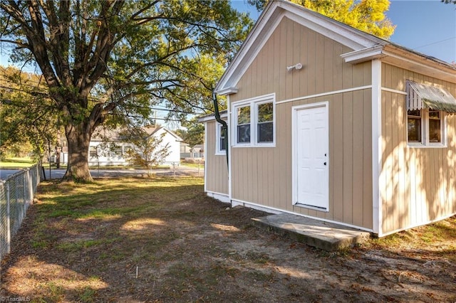 view of outdoor structure featuring a yard