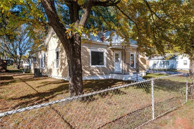 view of front of property with central AC unit