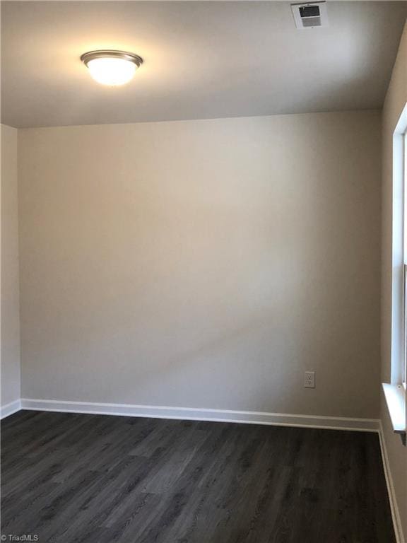 353 Aztec Dr, Winston-Salem, NC 27107 - spare room with dark wood-style floors