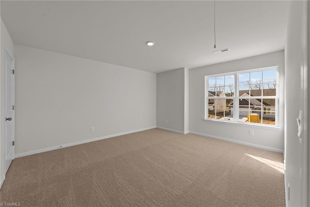 view of carpeted spare room