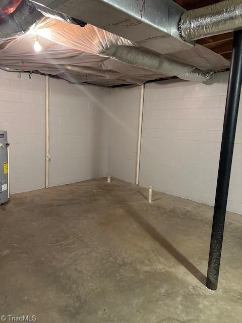 basement featuring water heater