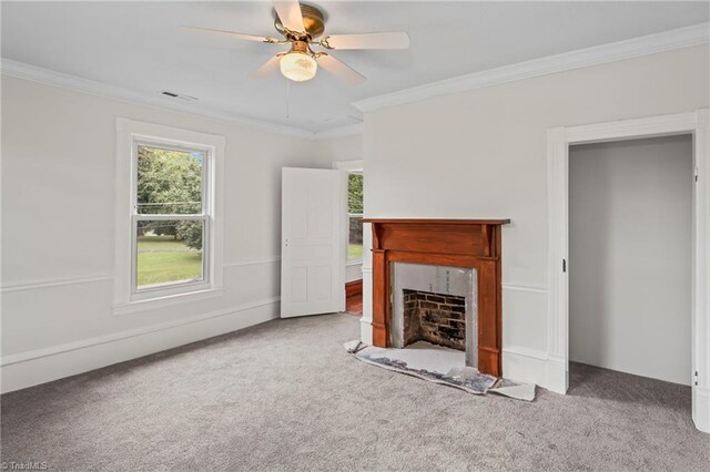 unfurnished living room with crown molding, ceiling fan, and carpet floors