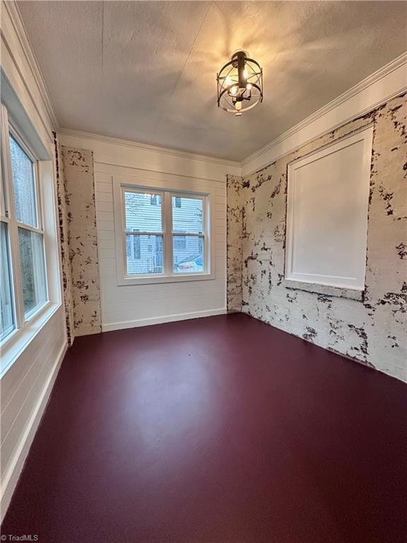 1214 Fillman Dr, Reidsville, NC 27320 - spare room with a textured ceiling, crown molding, and baseboards