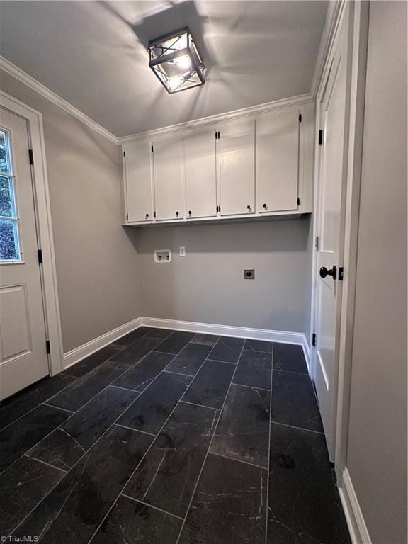 1214 Fillman Dr, Reidsville, NC 27320 - washroom featuring hookup for a washing machine, cabinet space, baseboards, and ornamental molding