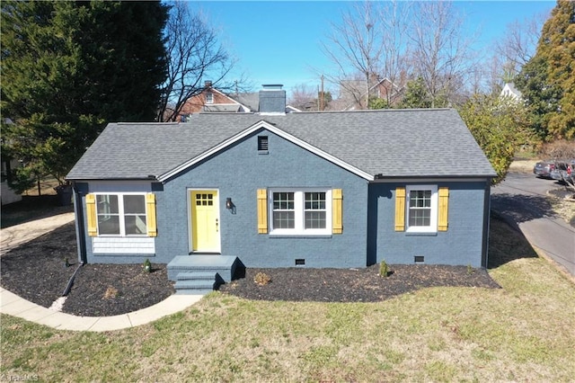 1214 Fillman Dr, Reidsville, NC 27320 - view of front of property featuring roof with shingles, a front yard, crawl space, brick siding, and a chimney