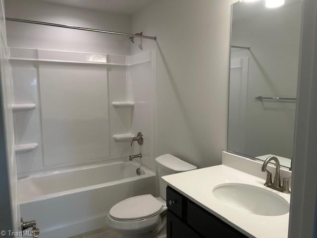 full bathroom featuring vanity, shower / washtub combination, and toilet