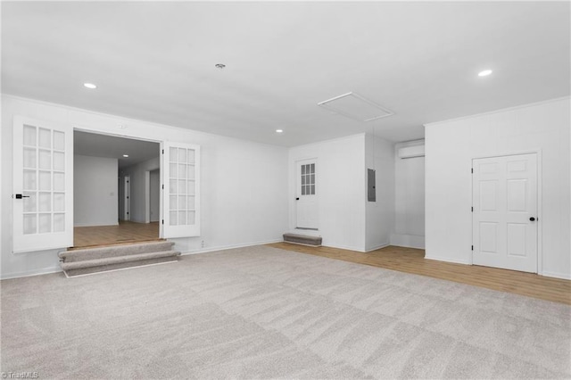 2282 Valewood Dr, Asheboro, NC 27205 - carpeted spare room featuring electric panel, french doors, attic access, recessed lighting, and a wall unit AC