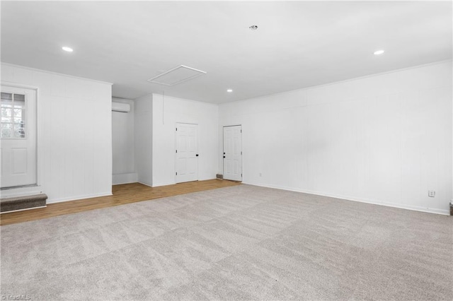 2282 Valewood Dr, Asheboro, NC 27205 - unfurnished room featuring attic access, carpet floors, a wall mounted air conditioner, and recessed lighting
