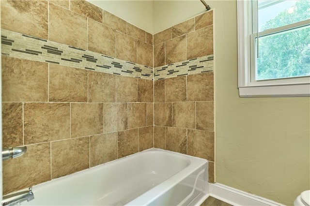 bathroom featuring shower / washtub combination