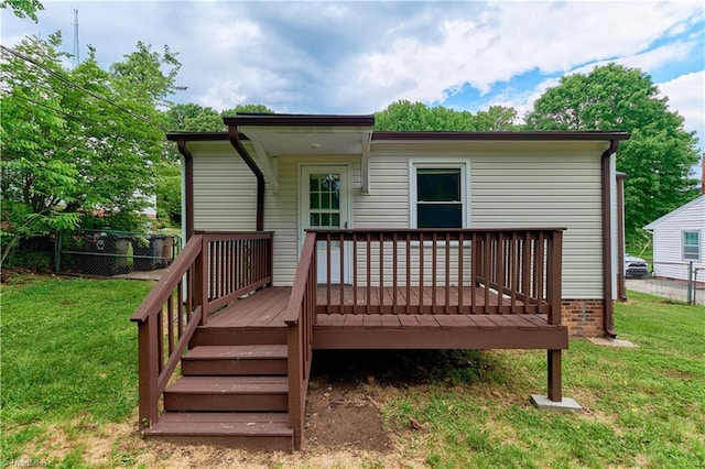 back of property with a deck