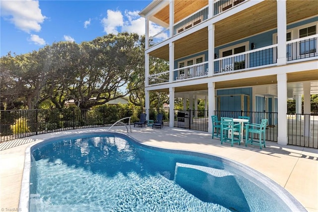 view of pool featuring a patio area