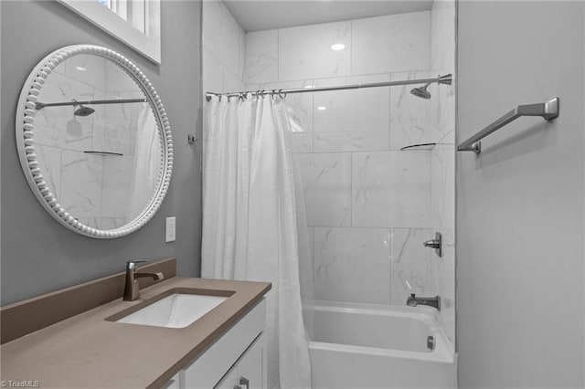 bathroom with vanity and shower / tub combo with curtain