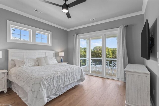 bedroom with access to exterior, crown molding, light hardwood / wood-style flooring, and ceiling fan