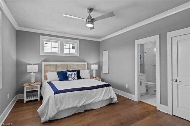 bedroom featuring ensuite bathroom, ceiling fan, hardwood / wood-style floors, and crown molding