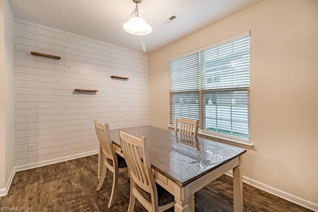 1881 Huntley Way, Burlington, NC 27215 - dining area with baseboards, wood finished floors, and wood walls