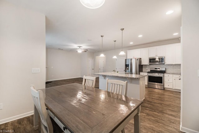 1881 Huntley Way, Burlington, NC 27215 - dining area featuring baseboards, dark wood-style flooring, a ceiling fan, and recessed lighting