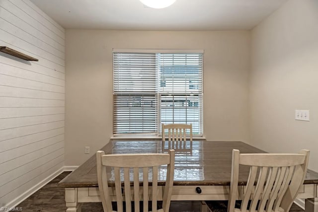 1881 Huntley Way, Burlington, NC 27215 - dining room featuring wooden walls, wood finished floors, and baseboards