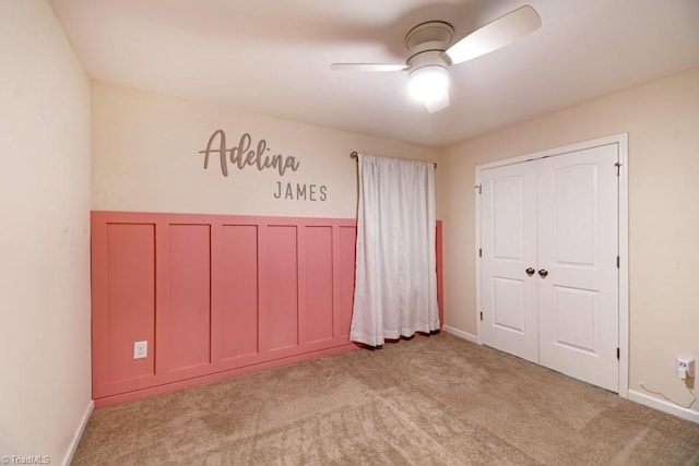 1881 Huntley Way, Burlington, NC 27215 - unfurnished bedroom featuring carpet floors, baseboards, a ceiling fan, and a closet