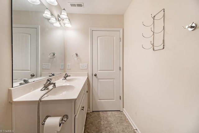 1881 Huntley Way, Burlington, NC 27215 - bathroom with double vanity and baseboards