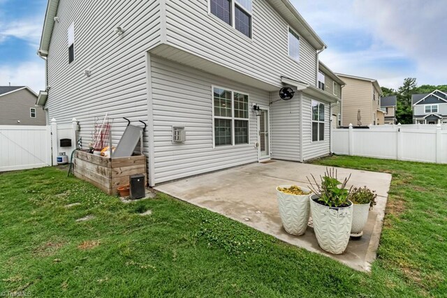1881 Huntley Way, Burlington, NC 27215 - back of house with a patio area and a gate