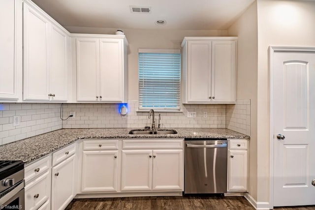 1881 Huntley Way, Burlington, NC 27215 - kitchen featuring stainless steel appliances, a sink, white cabinetry, light stone counters, and tasteful backsplash
