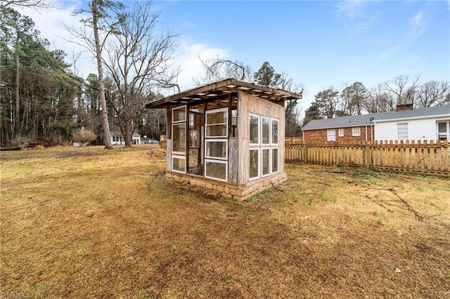 view of outdoor structure featuring a yard