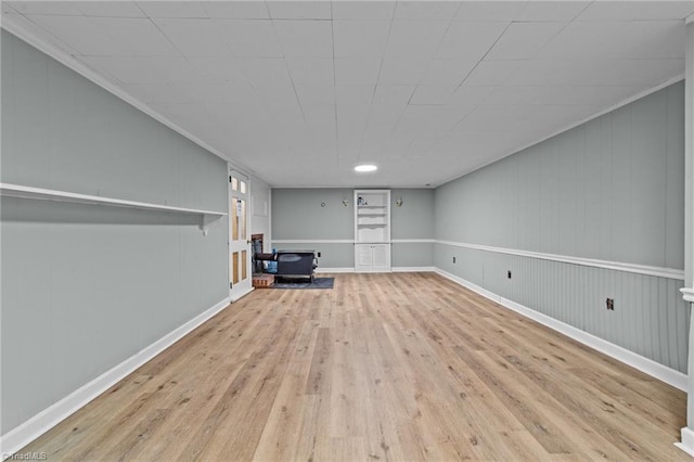 basement featuring light wood-type flooring