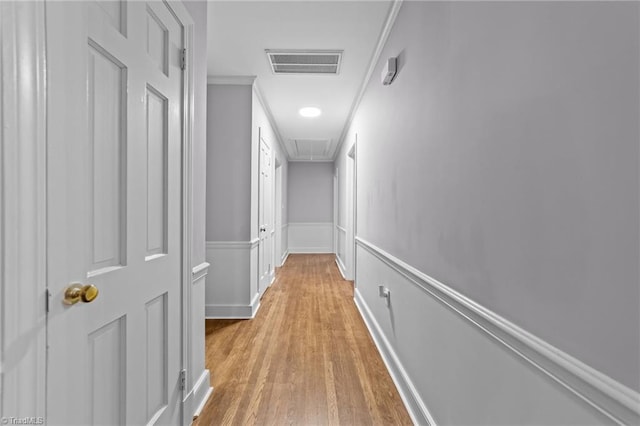 corridor featuring light hardwood / wood-style floors