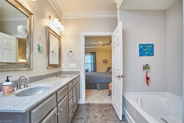 full bathroom featuring crown molding, a bath, double vanity, and a sink