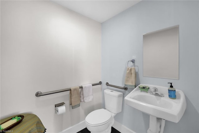 225 Main St E, Pilot Mountain, NC 27041 - bathroom with toilet and baseboards