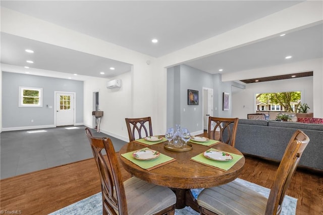 225 Main St E, Pilot Mountain, NC 27041 - dining area with a wall unit AC, plenty of natural light, recessed lighting, and baseboards