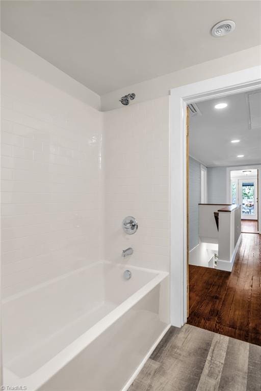 225 Main St E, Pilot Mountain, NC 27041 - bathroom featuring wood finished floors, shower / bath combination, and recessed lighting