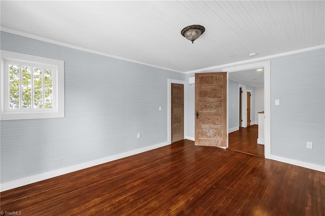 225 Main St E, Pilot Mountain, NC 27041 - spare room featuring hardwood / wood-style floors, baseboards, and ornamental molding